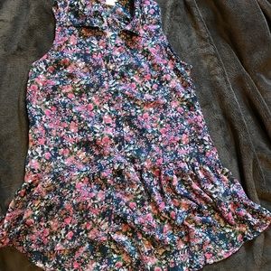 Floral button up blouse with ruffles on bottom